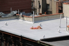 Jeffrey-Wiener_Girl-on-a-Roof